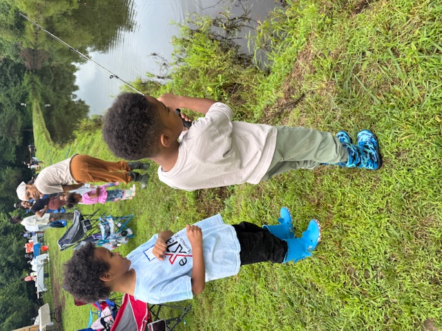 Two boys fishing together